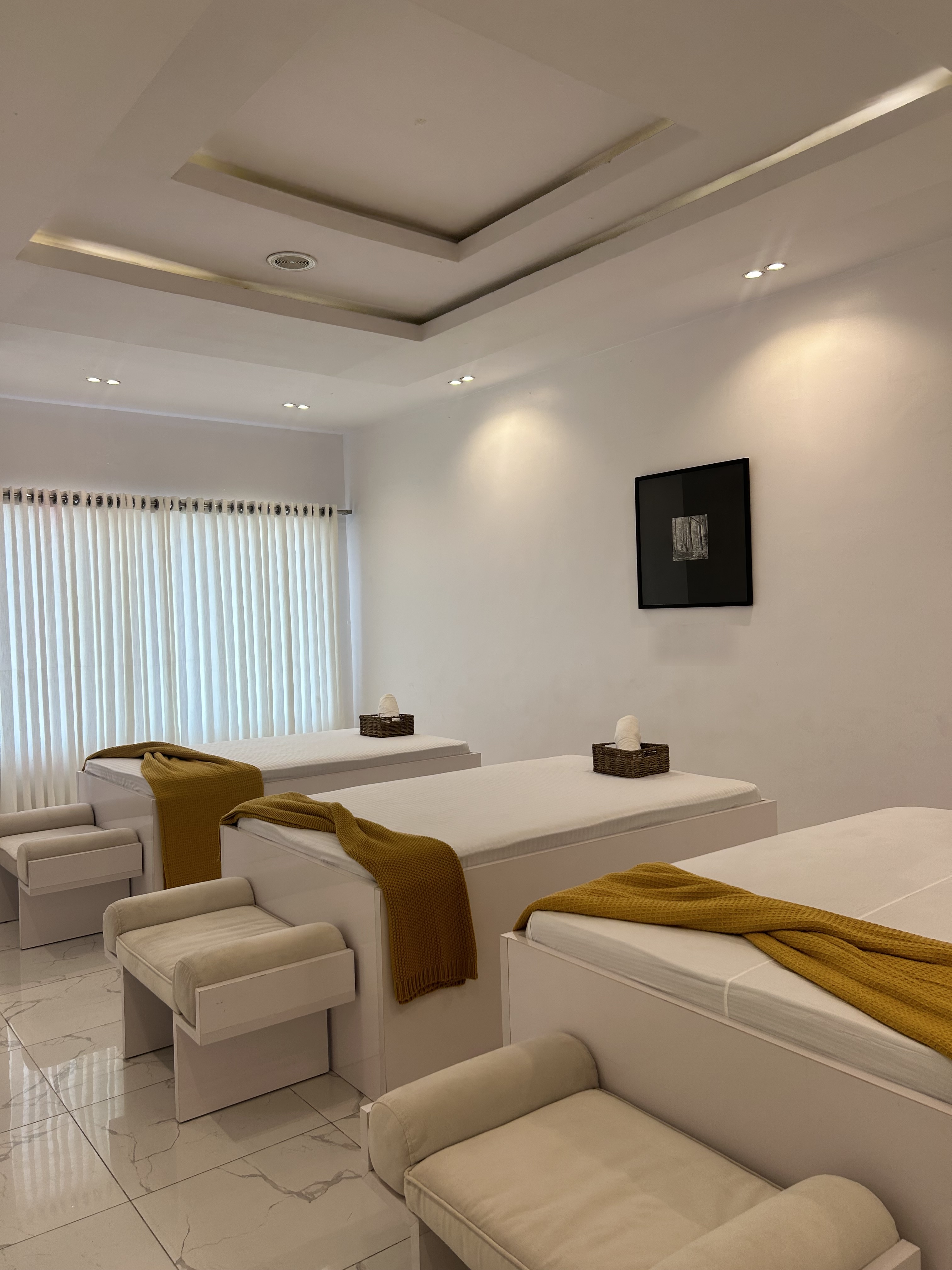 Luxury spa treatment room with soft natural light